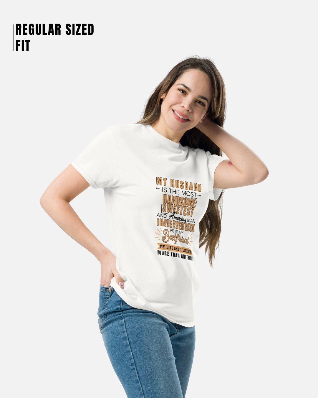 Woman wearing a white t-shirt with text, standing against a plain background